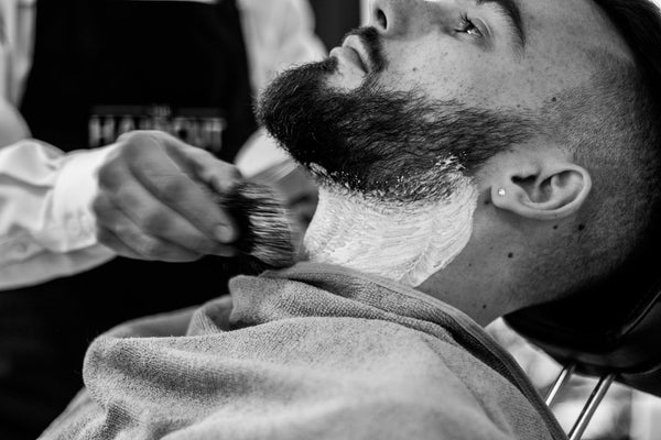 man getting a beard trim