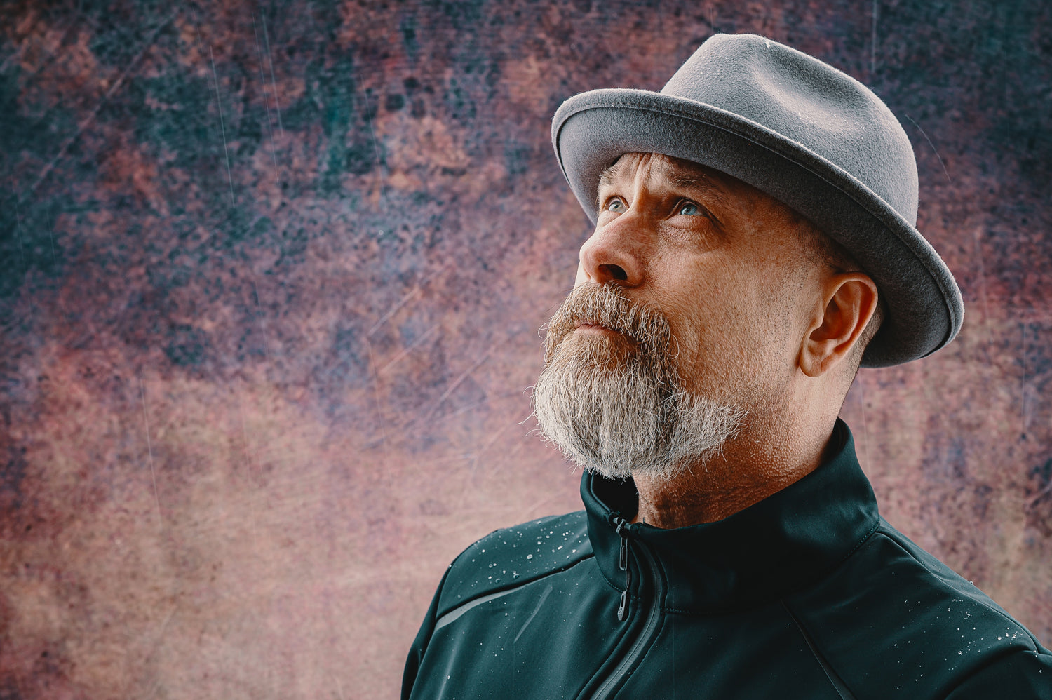 man with a white beard with dandruff